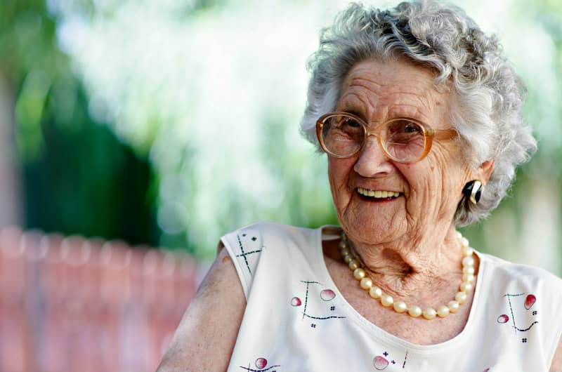 Happy and content Elderly lady Cared for by Spring Live in care